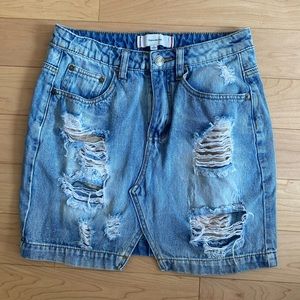 Distressed jean skirt